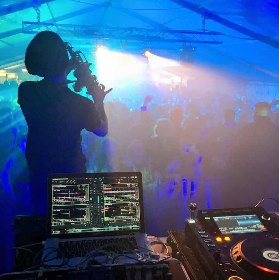 Why Use a DJ Agency - DJ and Saxophone